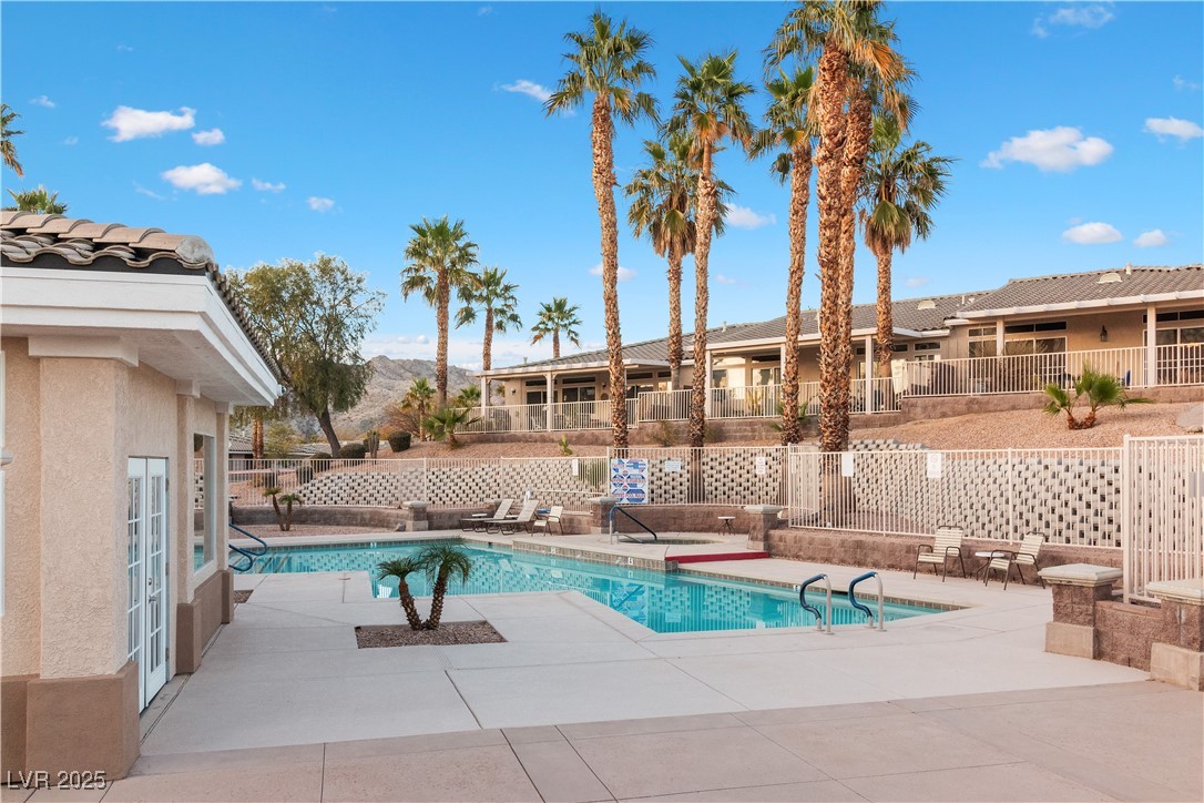 3342 Pheasant Canyon Way, Unit 1013 Laughlin, NV 89029 - Photo 65 of 74 Community Pool featuring a mountain view, a patio,