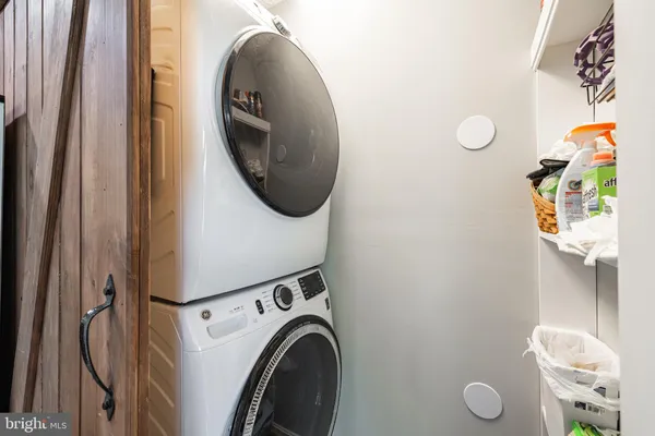 a close view of utility room with washer and dryer