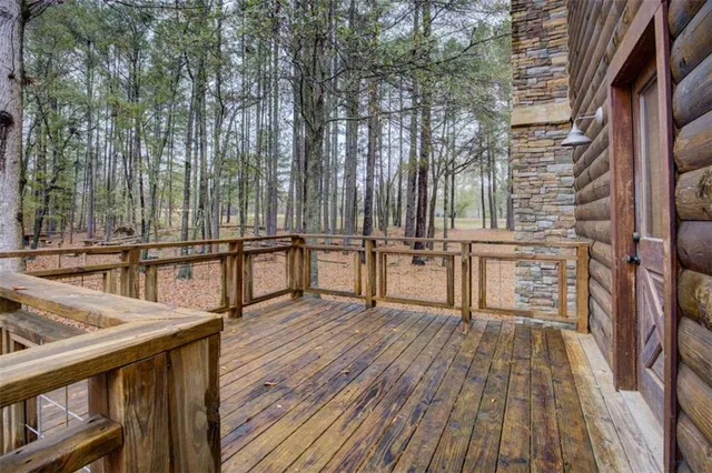 a view of balcony with furniture and wooden floor