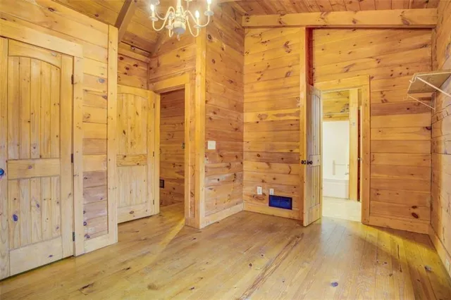 a view of a bathroom with a shower and a tub