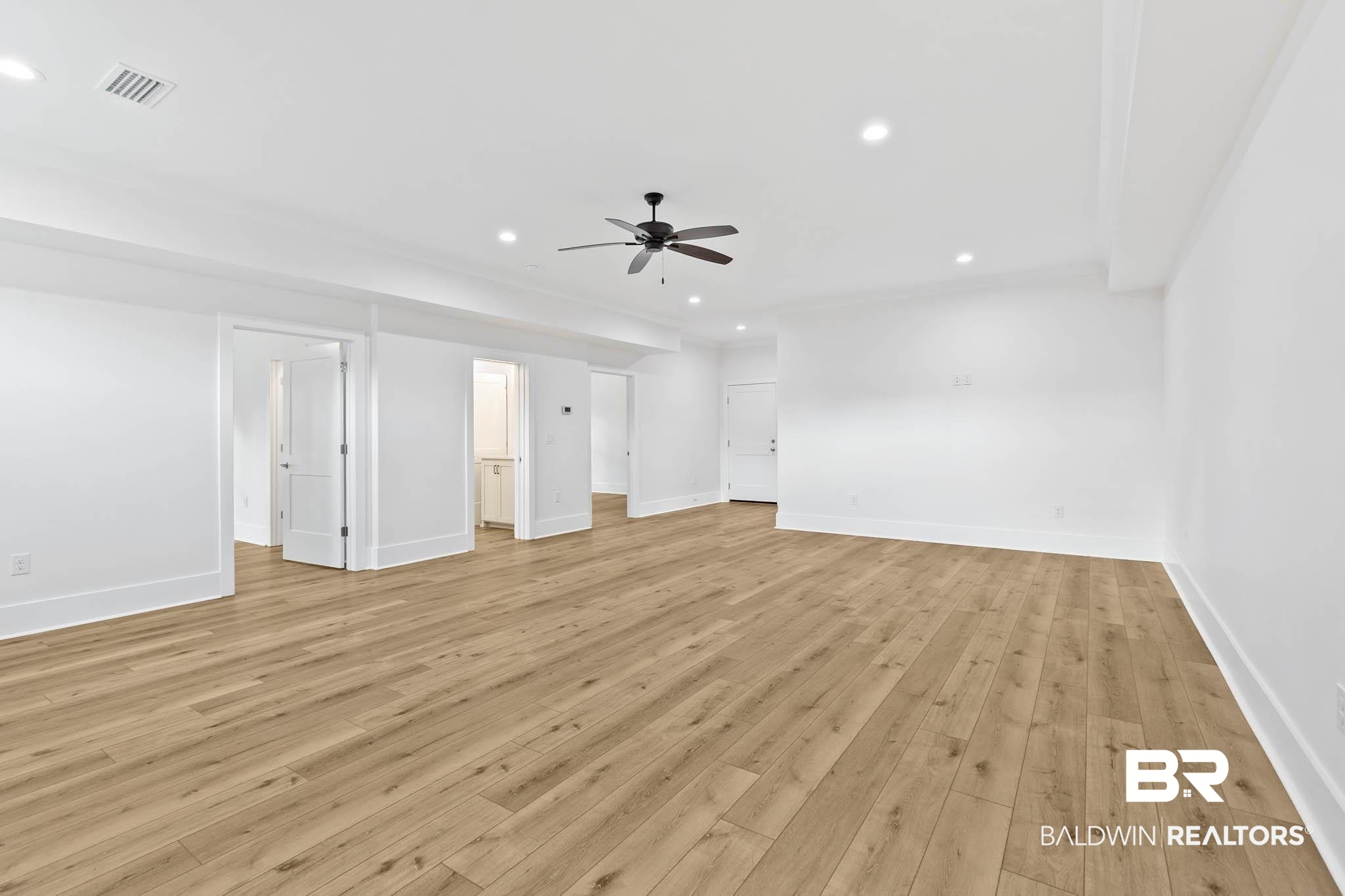 6656 Garrison Drive Daphne, AL 36527 - Photo 37 of 57 Unfurnished living room with recessed lighting, light wood finished floors, and a ceiling fan