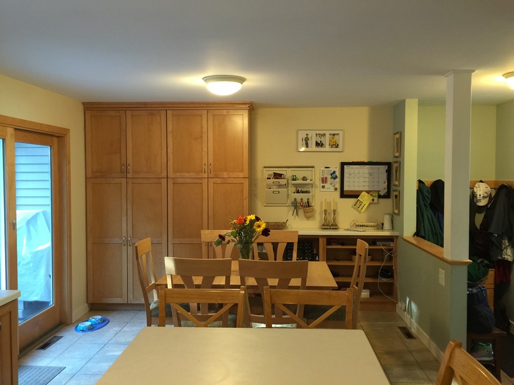 87 Aubinwood Road Amherst, MA 01002 - Photo 8 of 30 a view of a dining room with furniture and wooden floor
