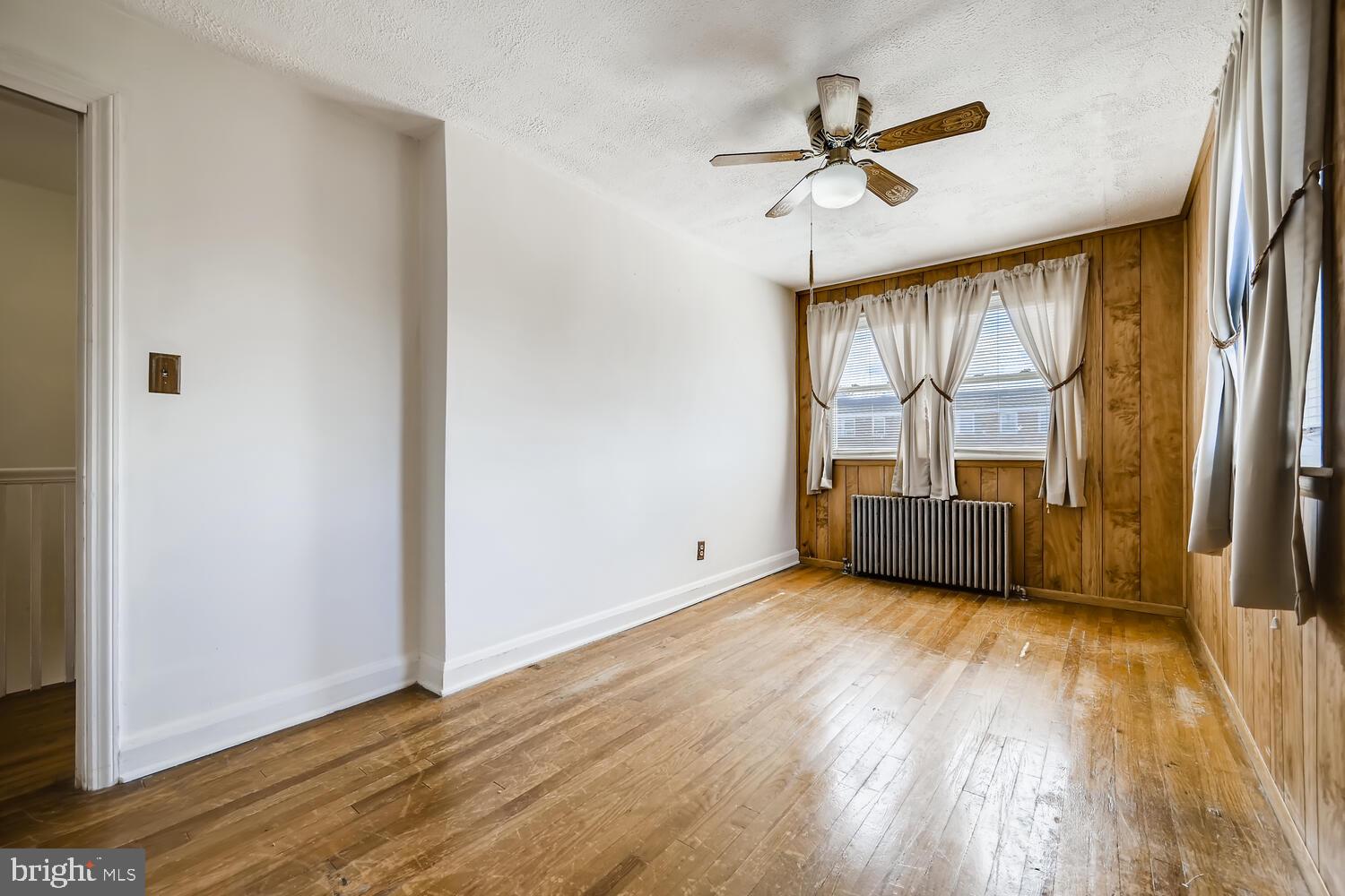 318 Arden Road West Baltimore, MD 21225 - Photo 17 of 32 a view of an empty room with a window