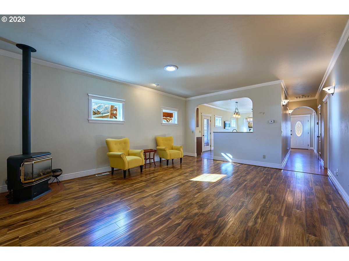 612 North Mill Street Joseph, OR 97846 - Photo 12 of 32 a living room with dining room and wooden floor
