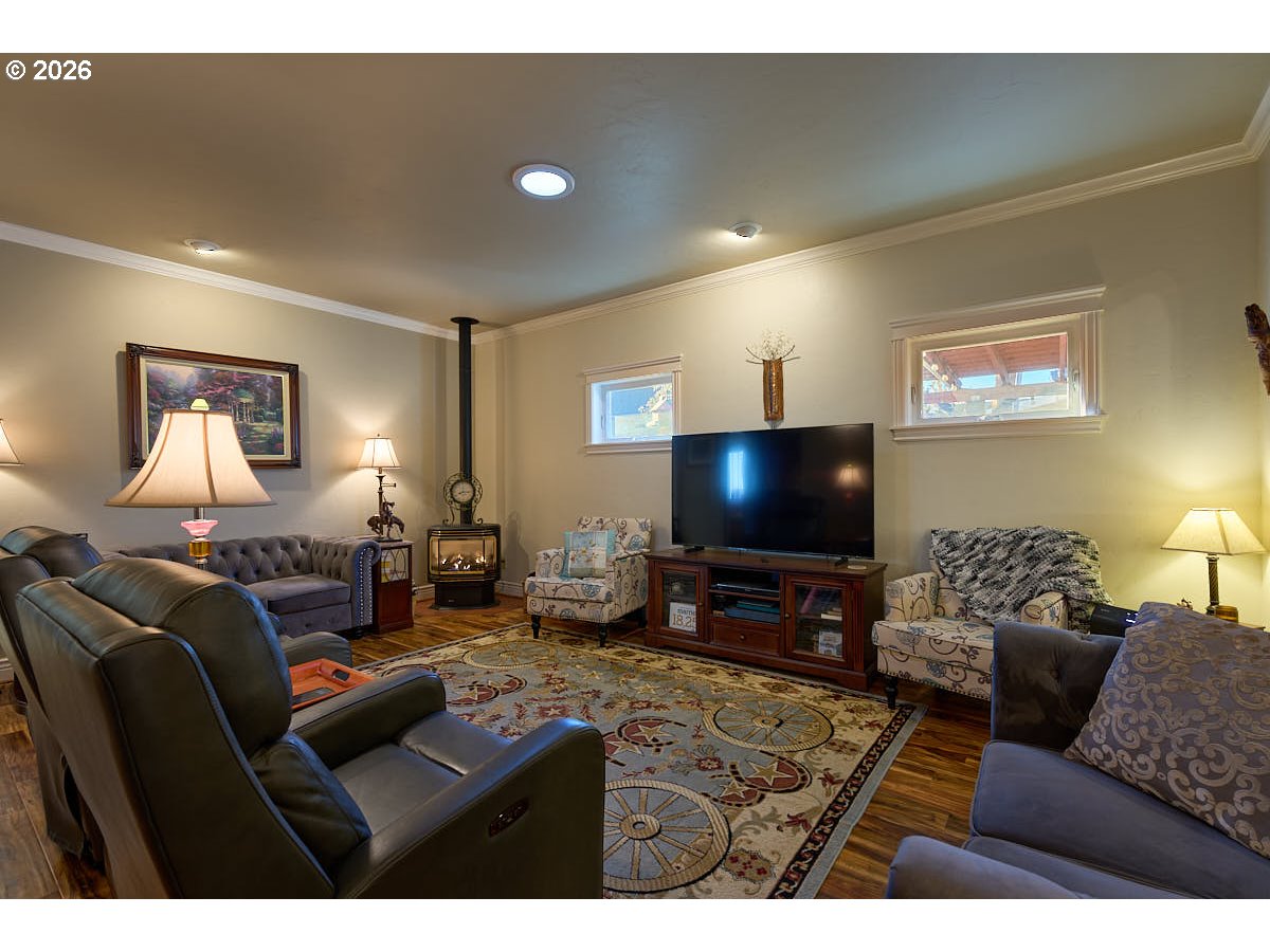 612 North Mill Street Joseph, OR 97846 - Photo 14 of 32 a living room with furniture and a flat screen tv