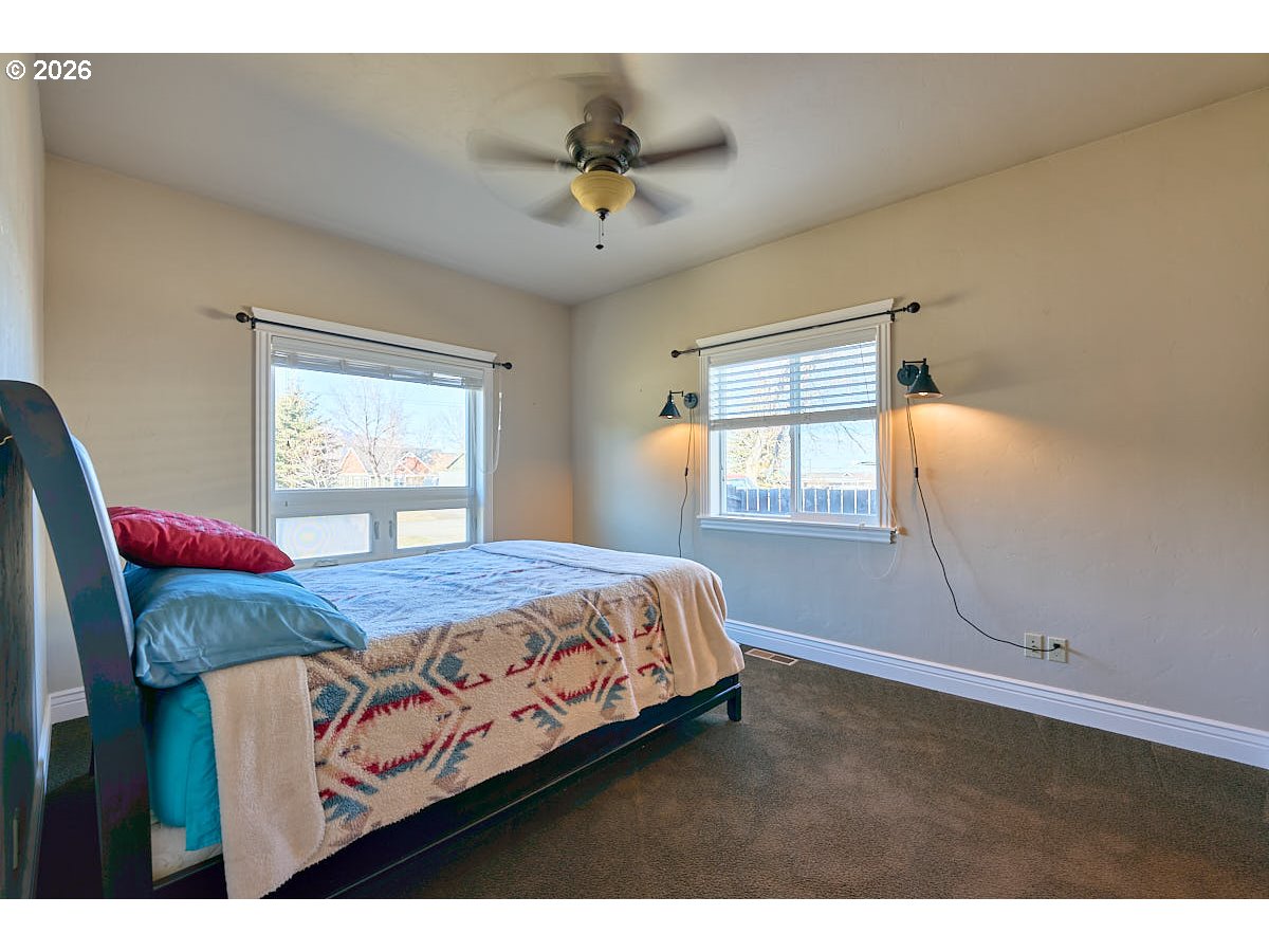 612 North Mill Street Joseph, OR 97846 - Photo 17 of 32 a bedroom with a bed and window
