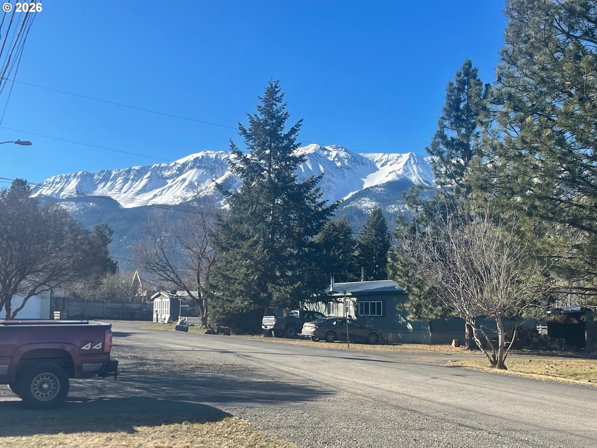 612 North Mill Street Joseph, OR 97846 - Photo 3 of 32 a front view of a house with a yard
