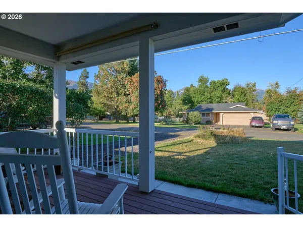 a view of a porch with a yard