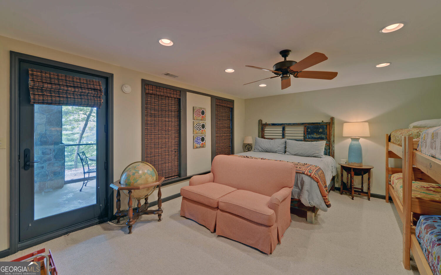 3540 Lake Rabun Road Lakemont, GA 30552 - Photo 49 of 81 a bedroom with a bed gym equipment and large windows