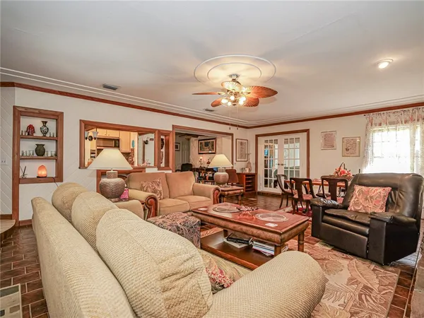 a kitchen with a stove and a white cabinets