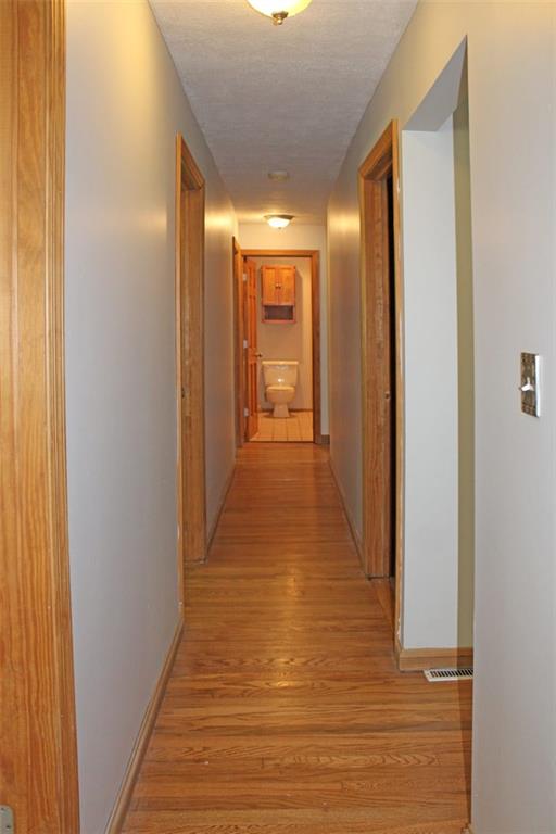 223 Kyle Road Valencia, PA 16059 - Photo 3 of 19 Hallway hard with wood floors