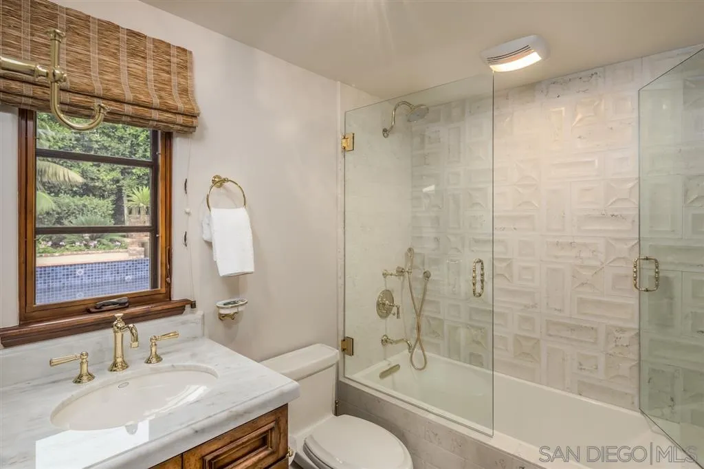901 Highland Avenue Del Mar, CA 92014 - Photo 17 of 25 a bathroom with a sink toilet tub and shower