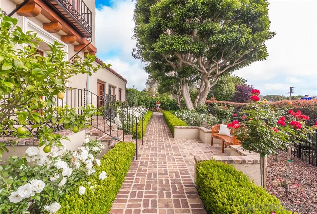 901 Highland Avenue Del Mar, CA 92014 - Photo 21 of 25 a front view of a house with a yard