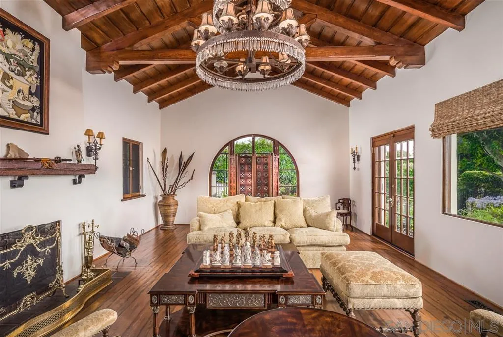901 Highland Avenue Del Mar, CA 92014 - Photo 6 of 25 a living room with furniture and a floor to ceiling window