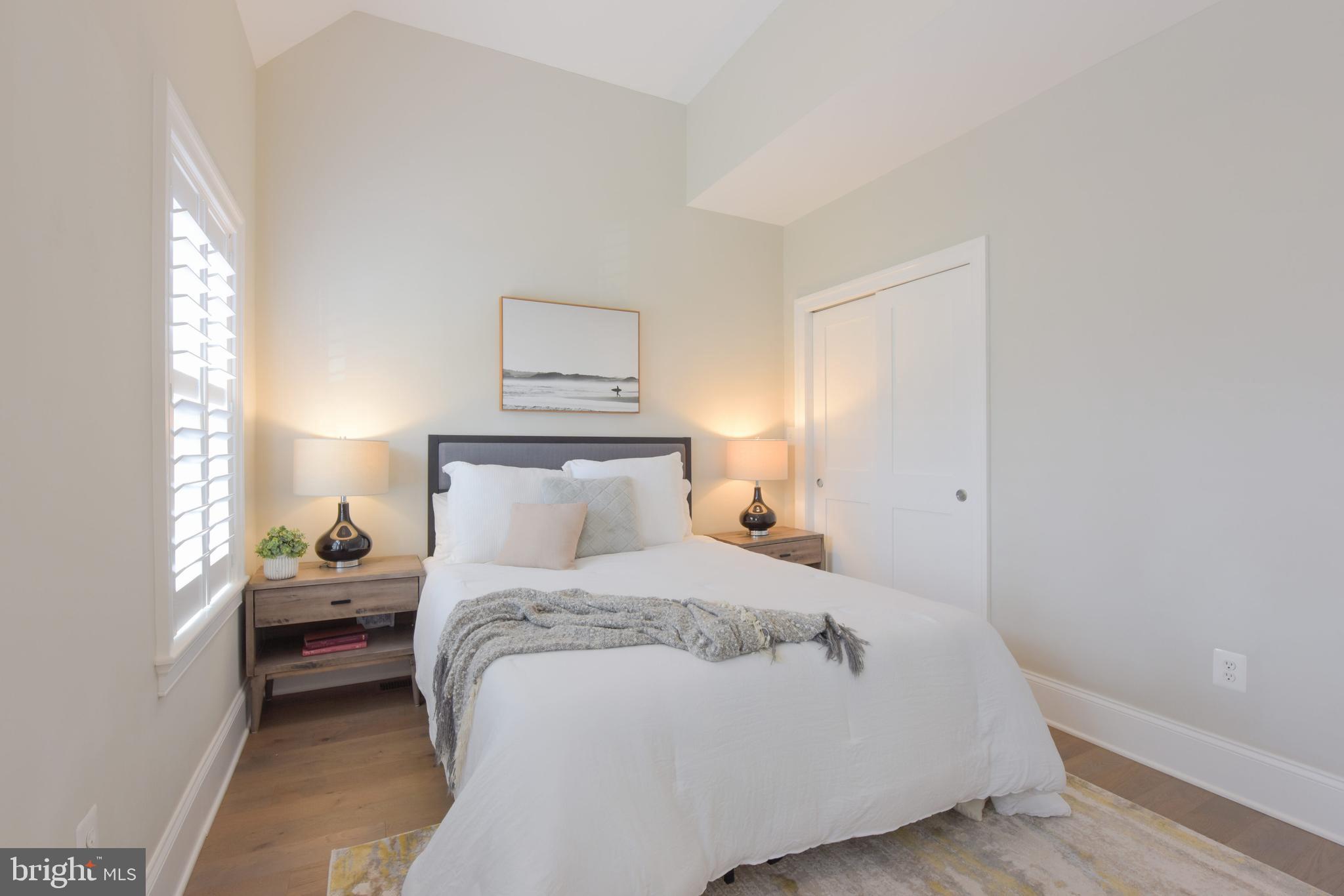 3921 Fulton Street Northwest, Unit 3 Washington, DC 20007 - Photo 20 of 24 a bedroom with a bed and window