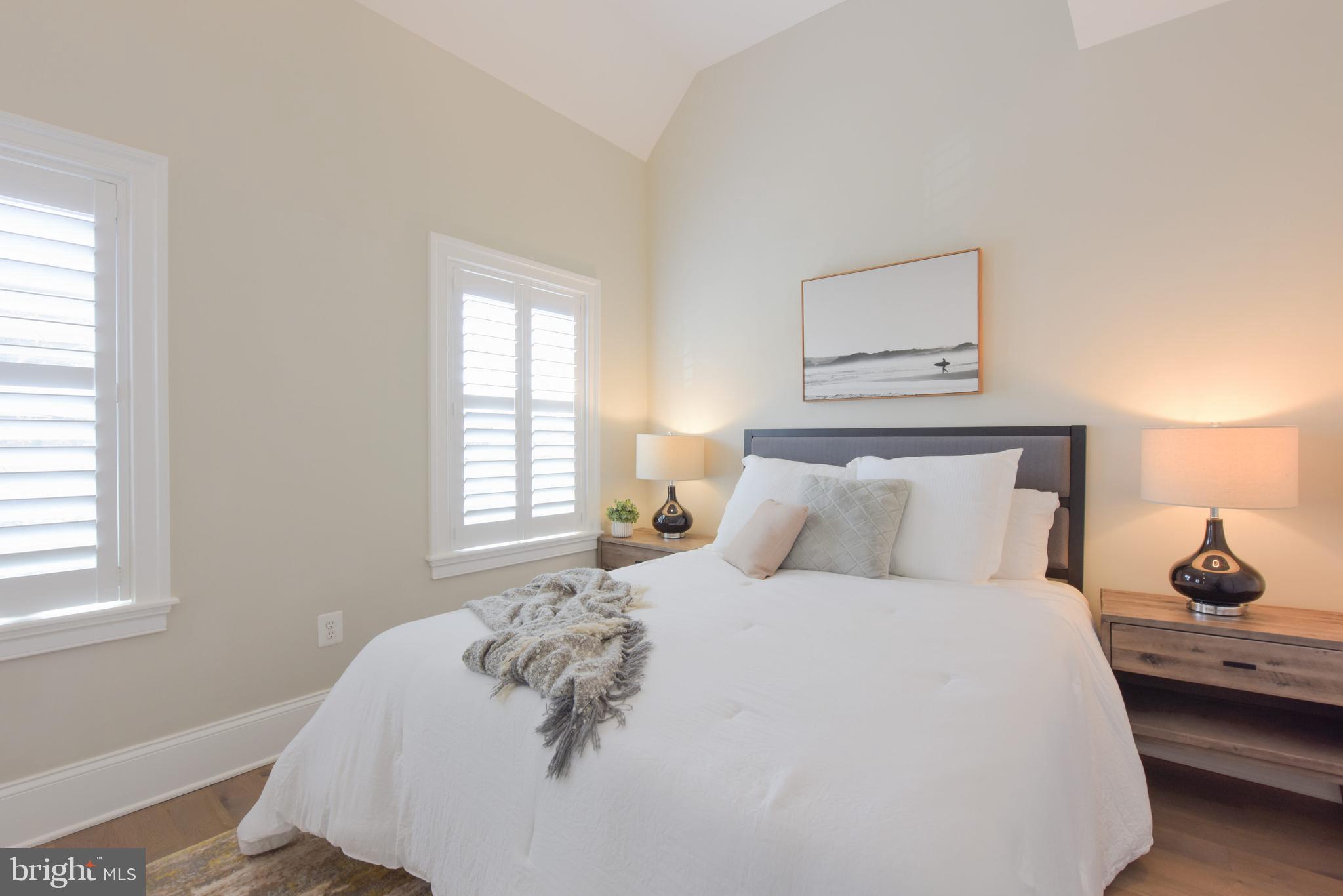 3921 Fulton Street Northwest, Unit 3 Washington, DC 20007 - Photo 21 of 24 a bedroom with a bed and window