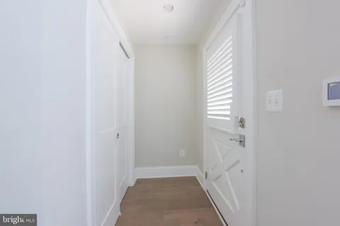 a view of hallway with windows