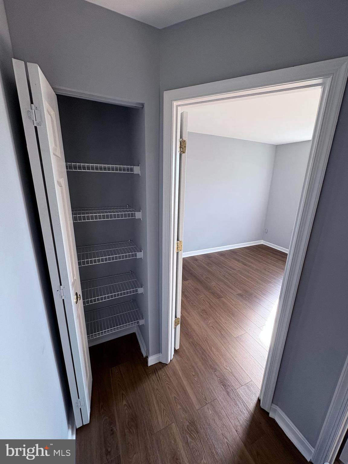 4211 Chapelgate Place Belcamp, MD 21017 - Photo 12 of 20 an empty room with wooden floor