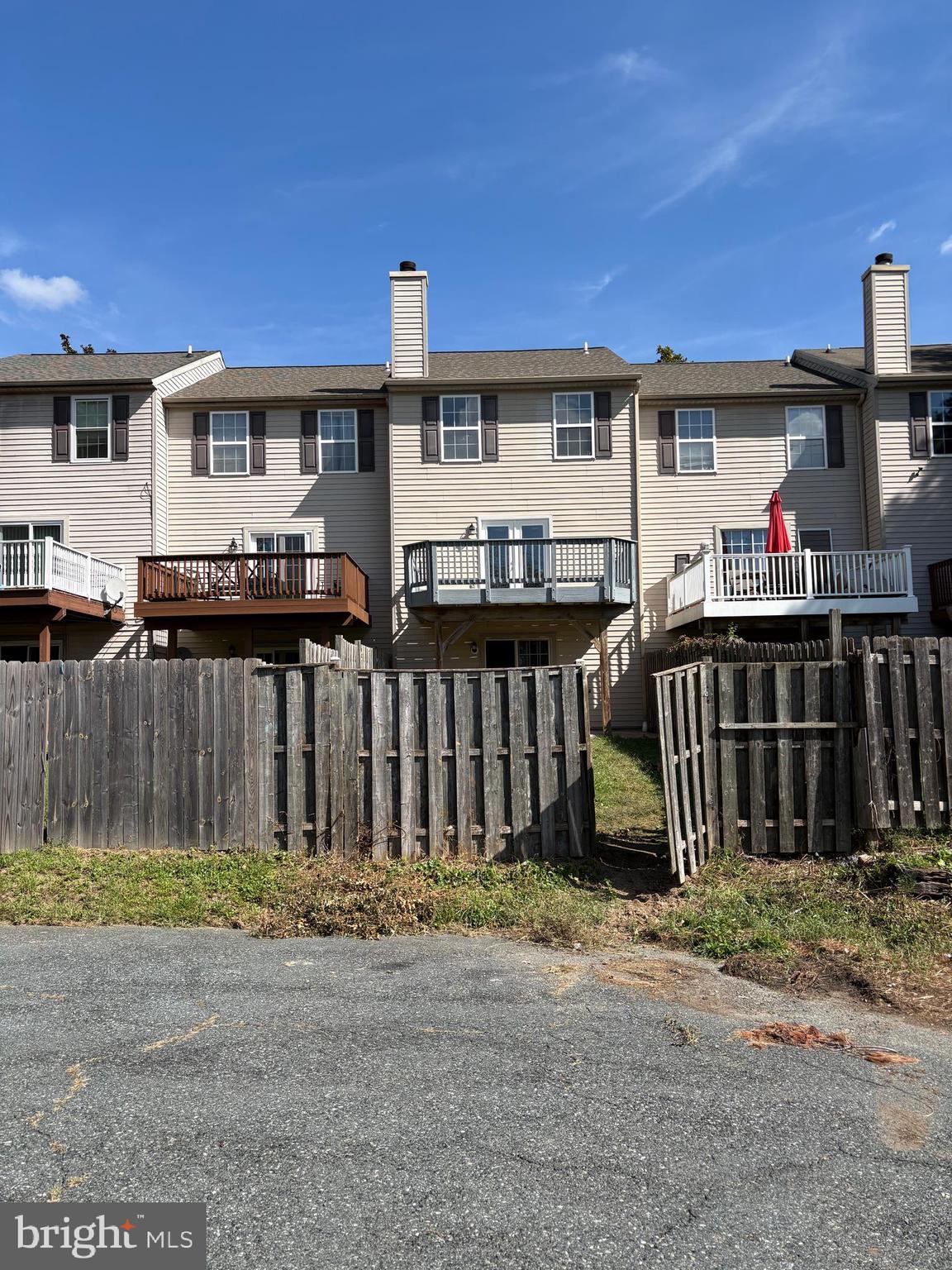 4211 Chapelgate Place Belcamp, MD 21017 - Photo 17 of 20 a front view of a house with a yard