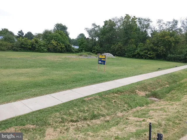 a view of a golf course with a lake