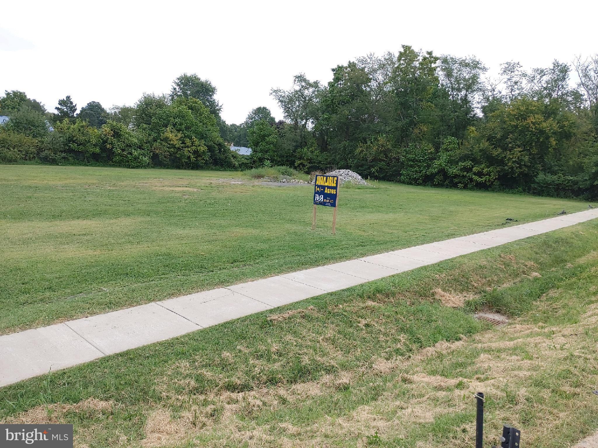 0 Front Street Frederica, DE 19946 - Photo 11 of 14 a view of a golf course with a lake