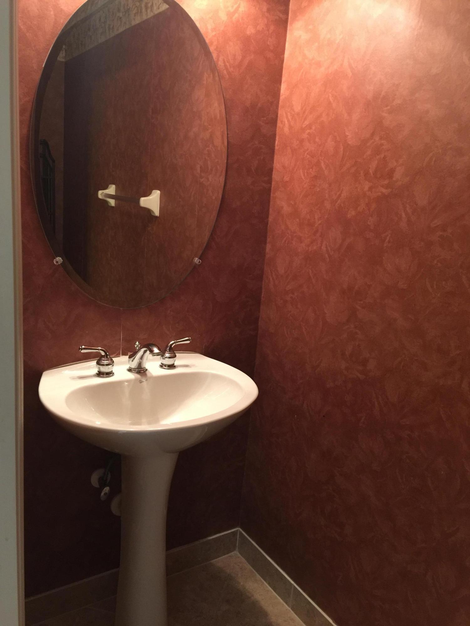 1004 Northwest 18th Avenue Boca Raton, FL 33431 - Photo 9 of 27 half bathroom downstairs