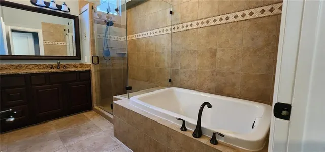 a bathroom with a sink and a shower