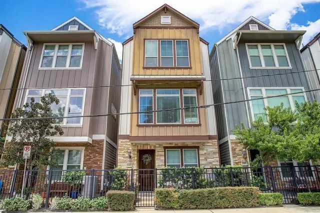 a view of a kitchen and a wooden floor