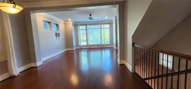 a kitchen with stainless steel appliances granite countertop a sink and a refrigerator