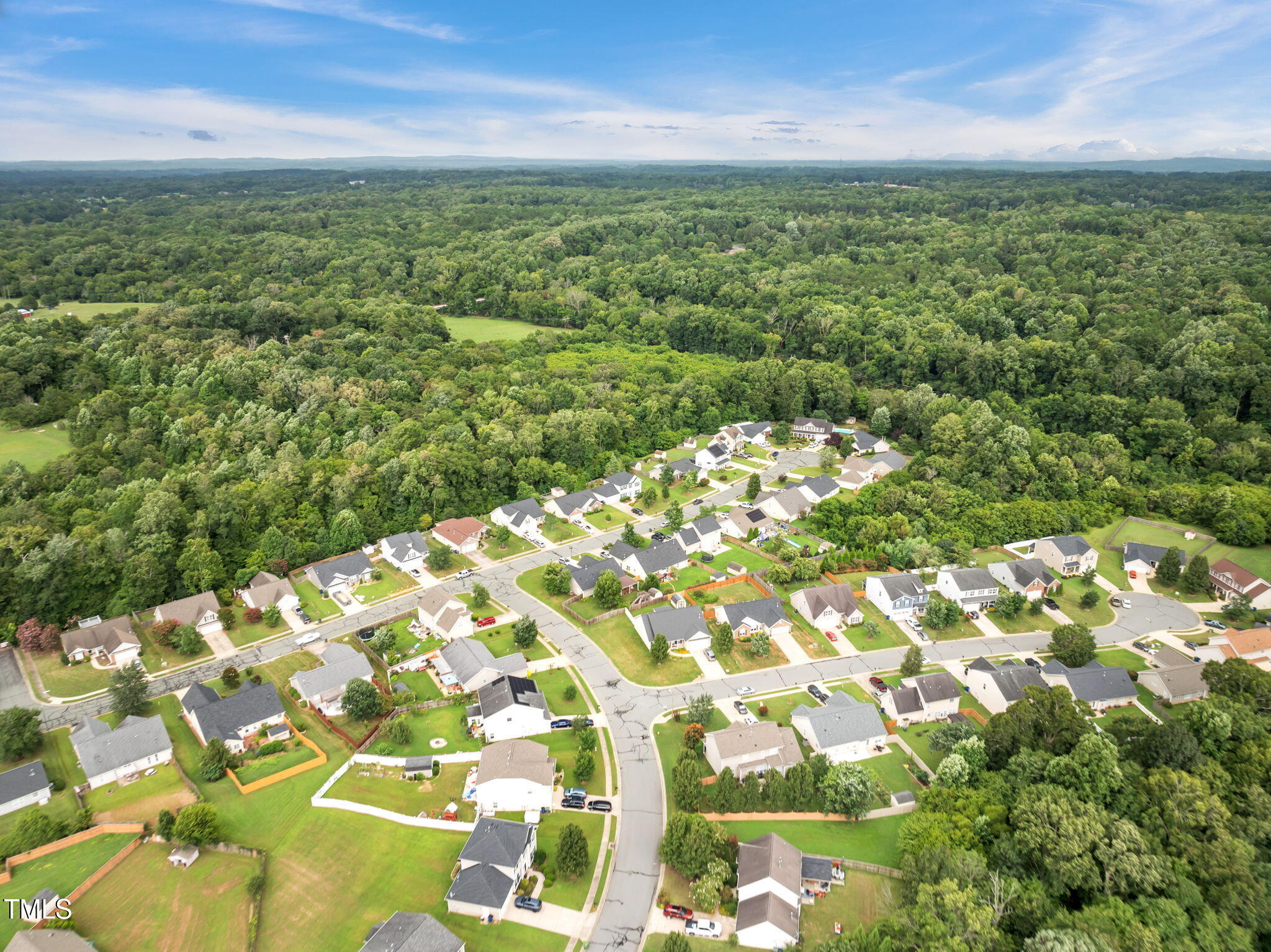 2708 Pepperstone Drive Graham, NC 27253 - Photo 4 of 9 a view of a yard with an outdoor space