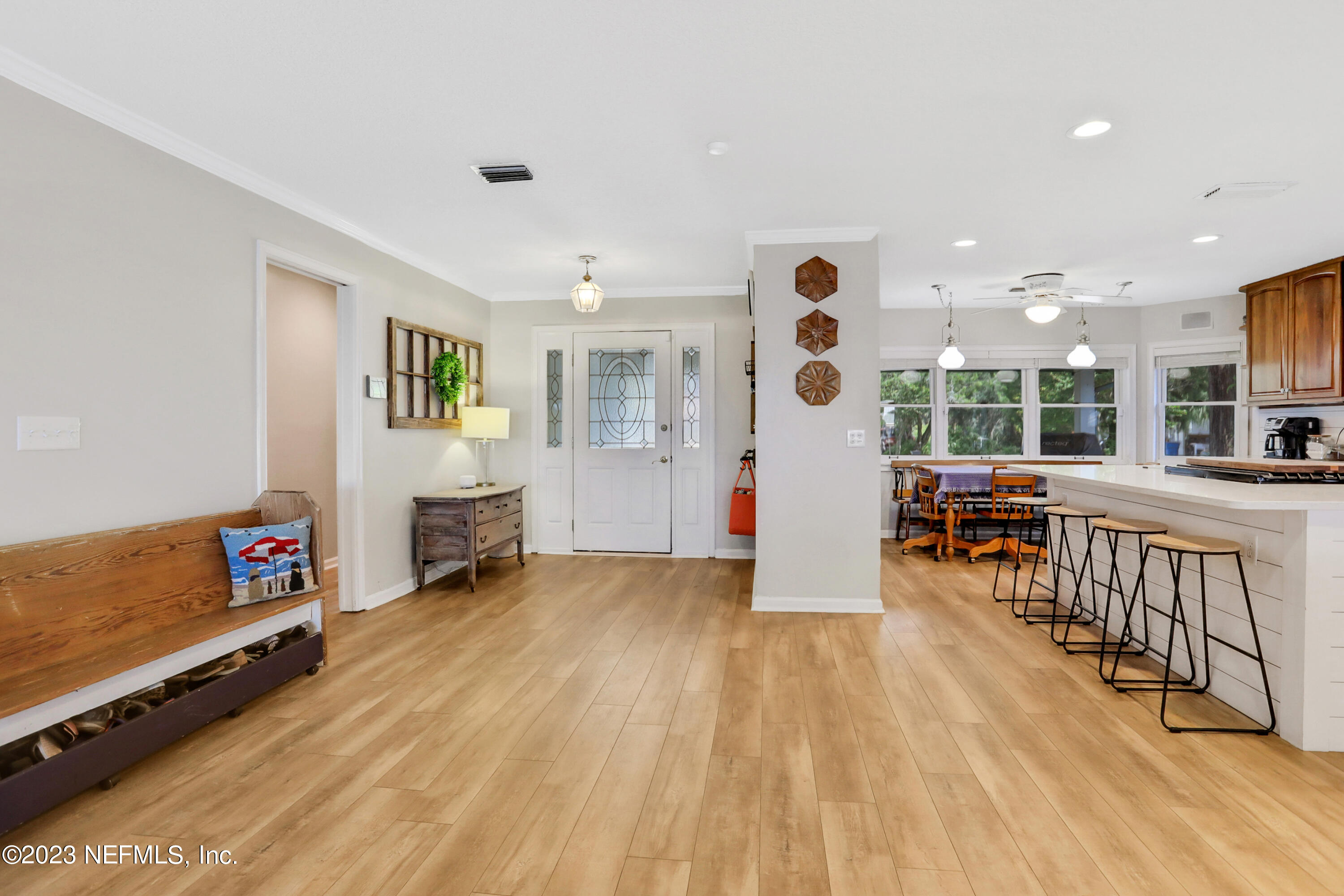 10100 Heckscher Drive Jacksonville, FL 32226 - Photo 12 of 90 a living room with furniture and wooden floor