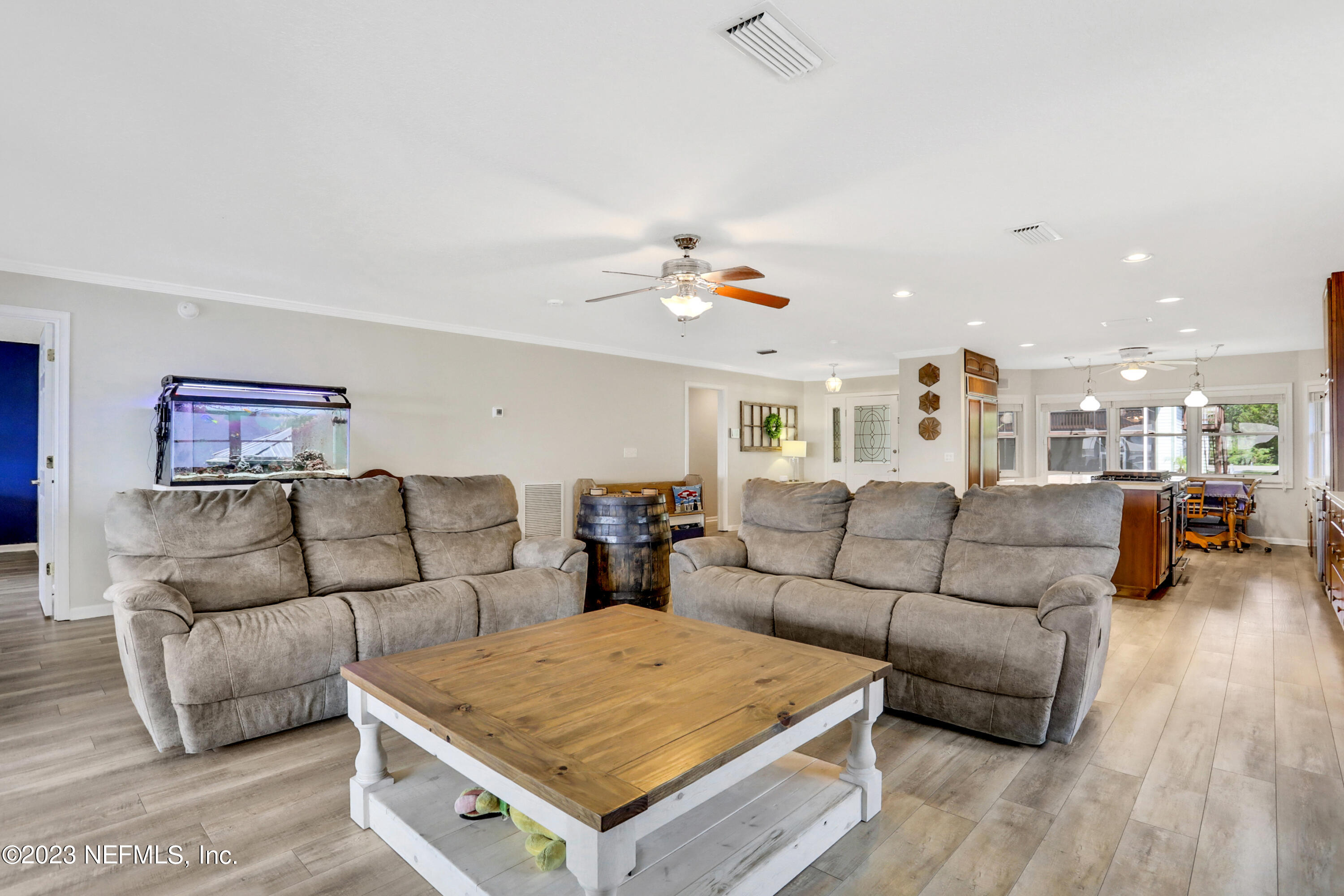 10100 Heckscher Drive Jacksonville, FL 32226 - Photo 16 of 90 a living room with furniture and a couch