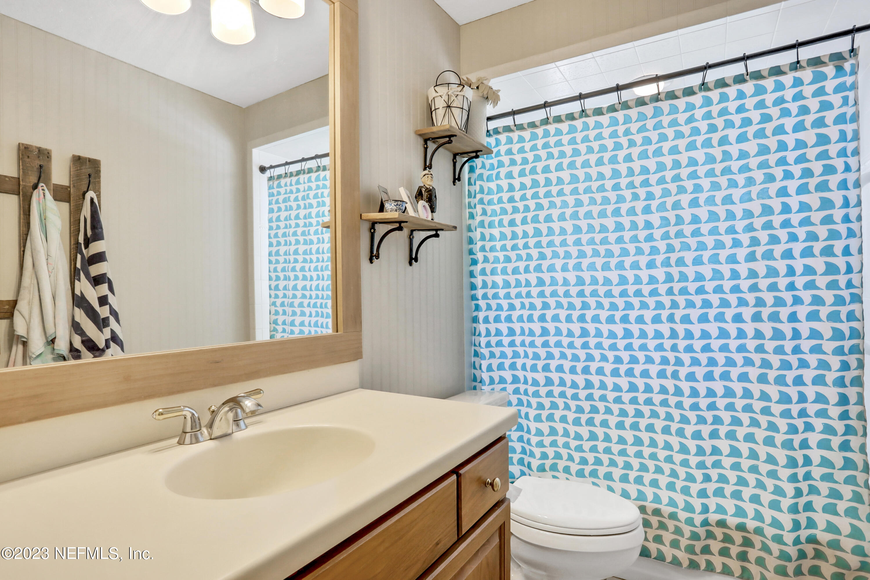 10100 Heckscher Drive Jacksonville, FL 32226 - Photo 28 of 90 a bathroom with a sink a toilet and shower