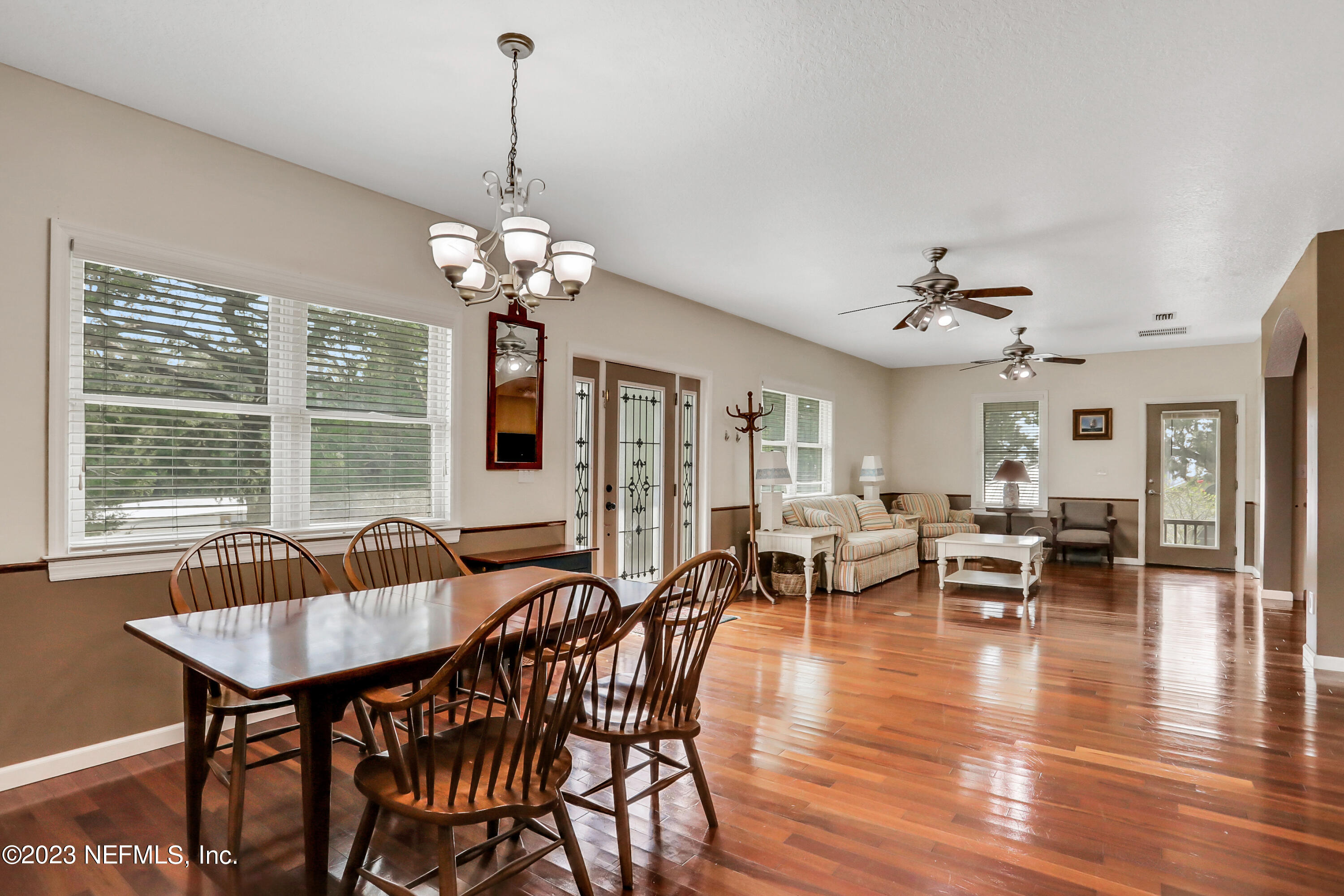 10100 Heckscher Drive Jacksonville, FL 32226 - Photo 36 of 90 a view of a dining room with furniture window and wooden floor