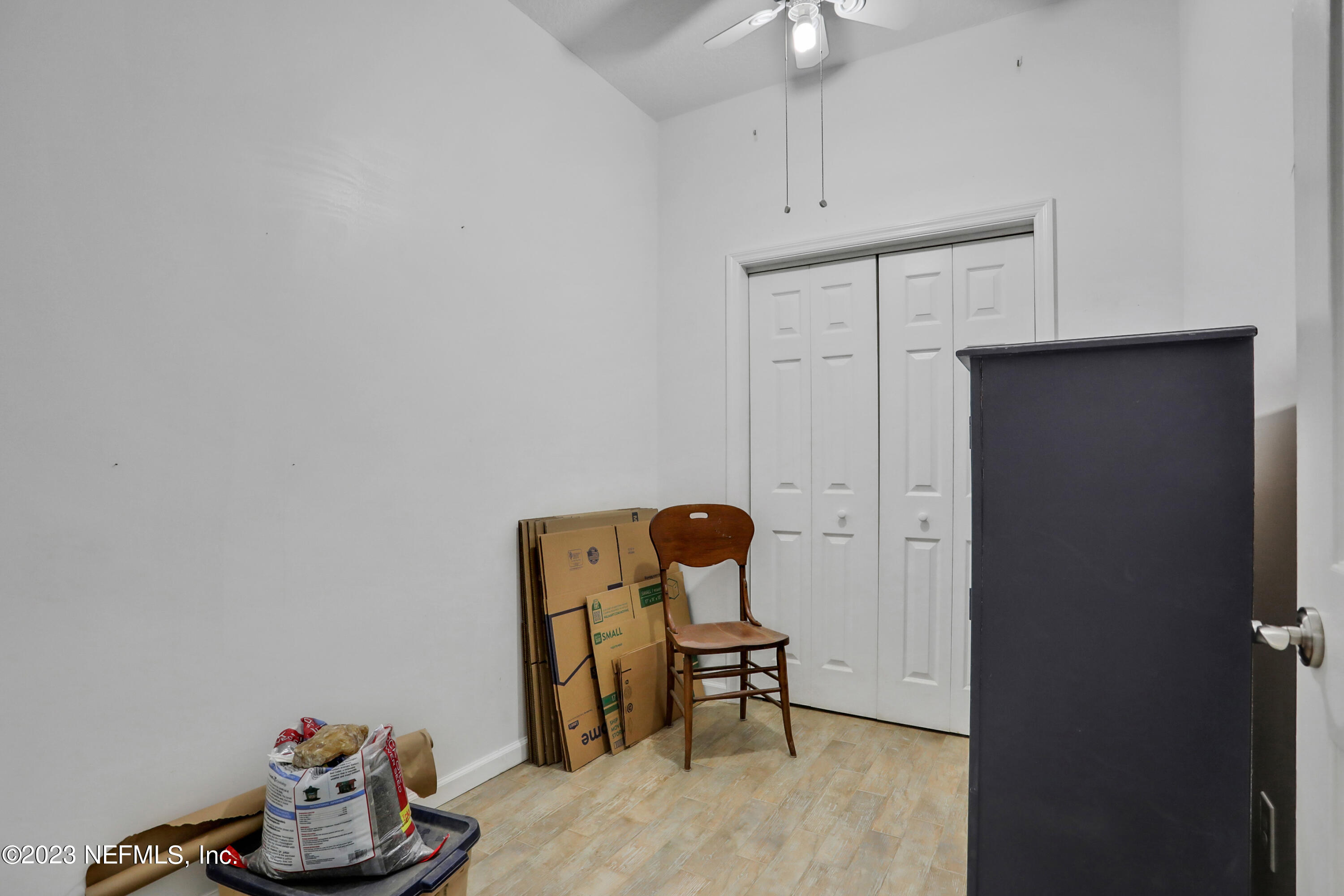 10100 Heckscher Drive Jacksonville, FL 32226 - Photo 68 of 90 a room with cabinets and wooden floor