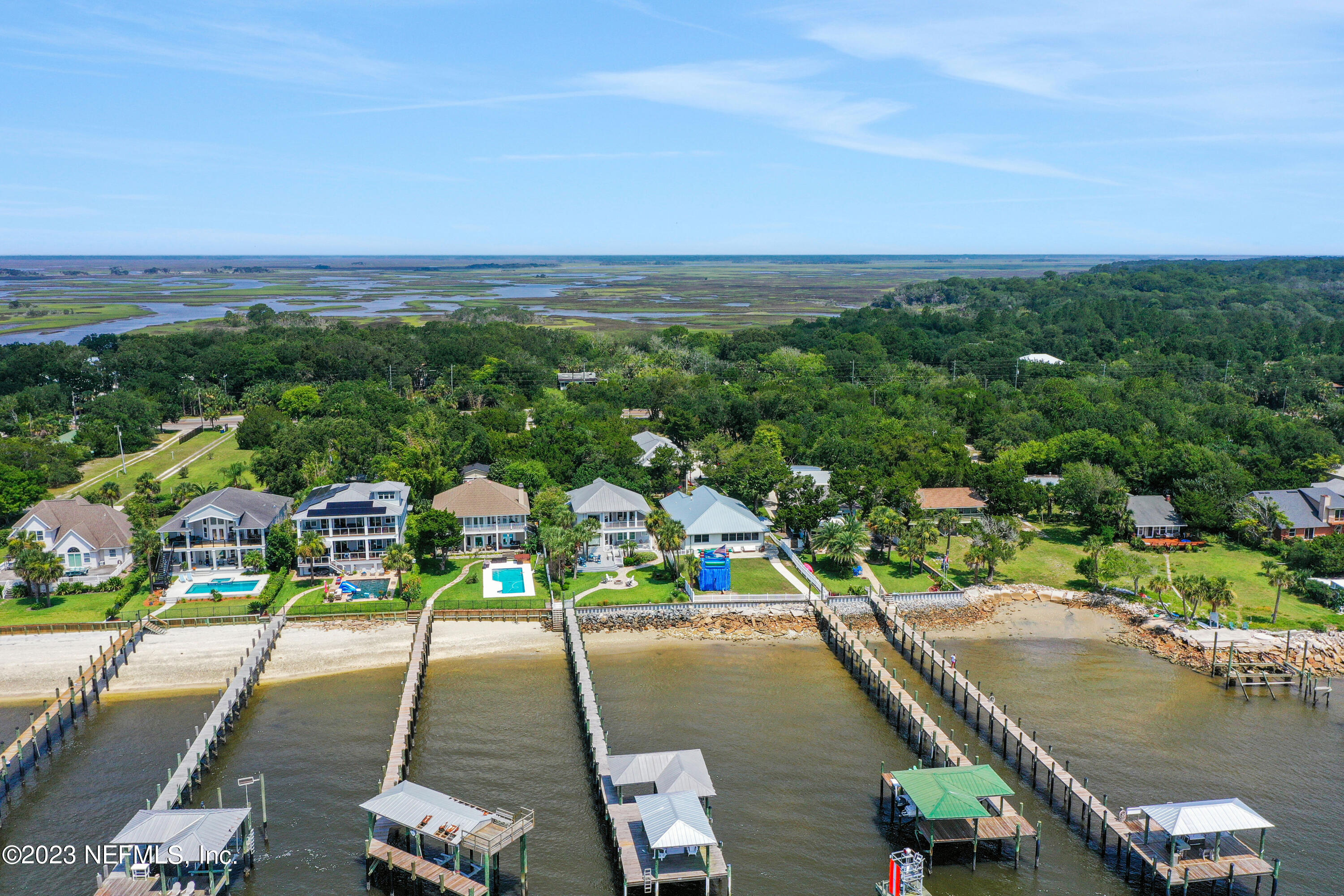 10100 Heckscher Drive Jacksonville, FL 32226 - Photo 80 of 90 an aerial view of residential houses with outdoor space and trees