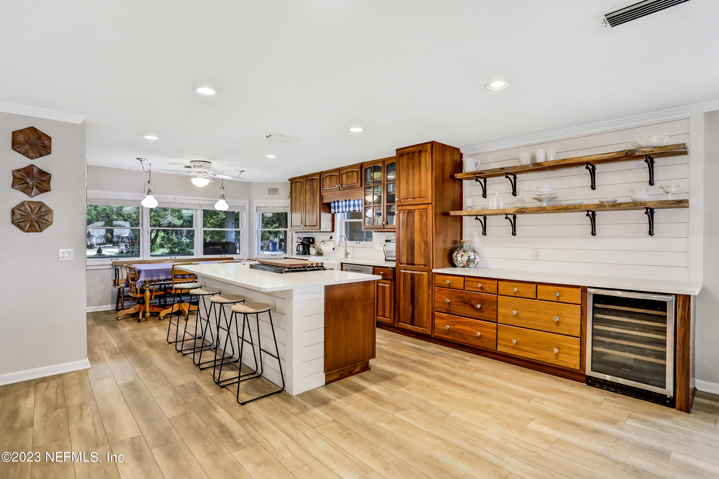 10100 Heckscher Drive Jacksonville, FL 32226 - Photo 8 of 90 a kitchen with stainless steel appliances kitchen island granite countertop a stove a sink and a refrigerator