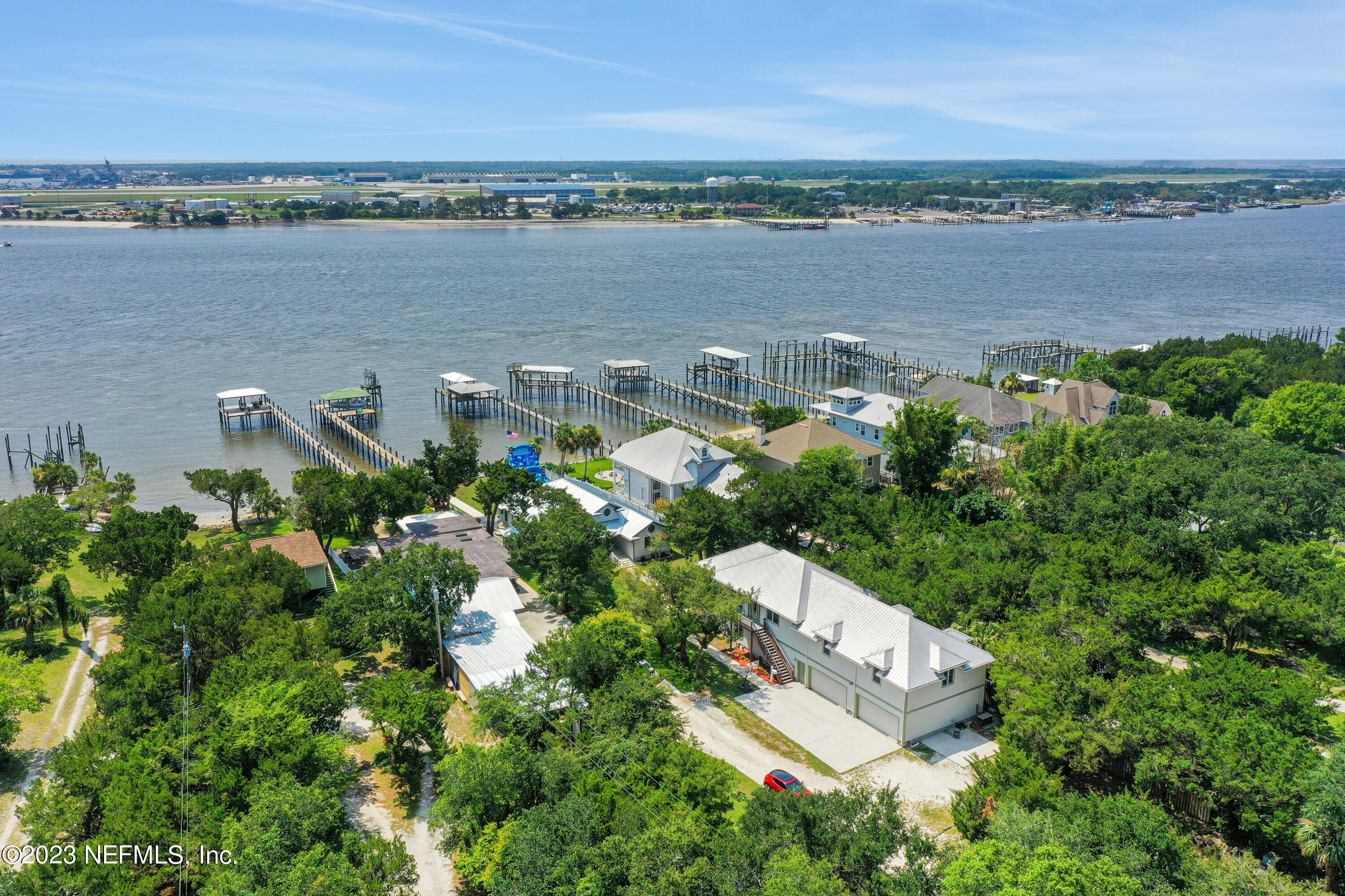 10100 Heckscher Drive Jacksonville, FL 32226 - Photo 84 of 90 an aerial view of a city with lots of residential buildings and ocean view