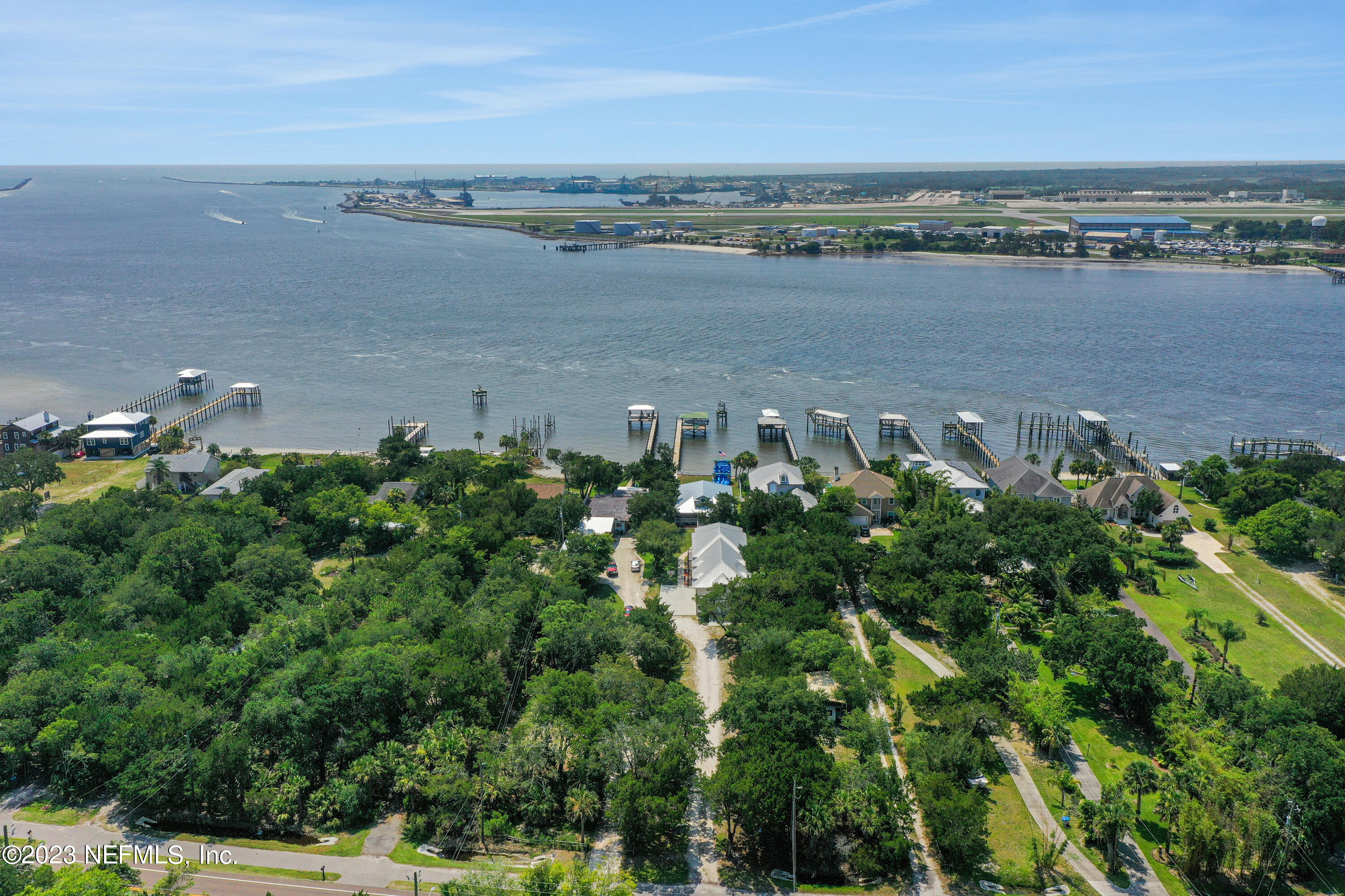 10100 Heckscher Drive Jacksonville, FL 32226 - Photo 89 of 90 an aerial view of a city with lots of residential buildings and lake view