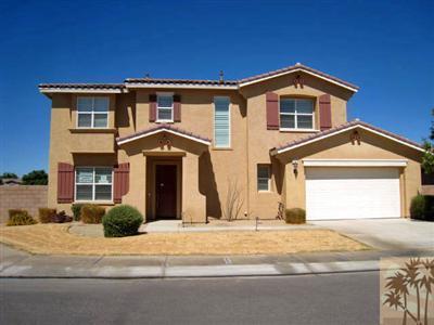 81908 Villa Reale Drive Indio, CA 92203 - Photo 1 of 25 a front view of a house with a yard