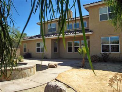 81908 Villa Reale Drive Indio, CA 92203 - Photo 11 of 25 a view of a house with snow on the road