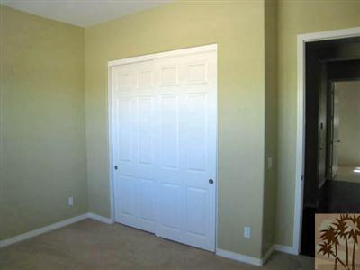 81908 Villa Reale Drive Indio, CA 92203 - Photo 12 of 25 an empty room with closet