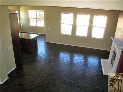 81908 Villa Reale Drive Indio, CA 92203 - Photo 15 of 25 wooden floor in an empty room with a window