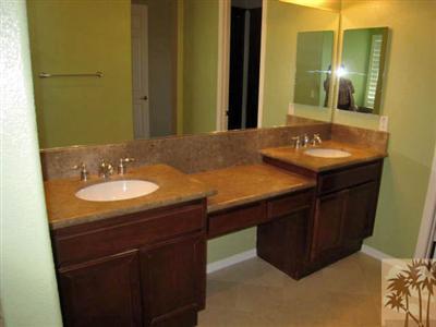 81908 Villa Reale Drive Indio, CA 92203 - Photo 17 of 25 a bathroom with a sink and a mirror