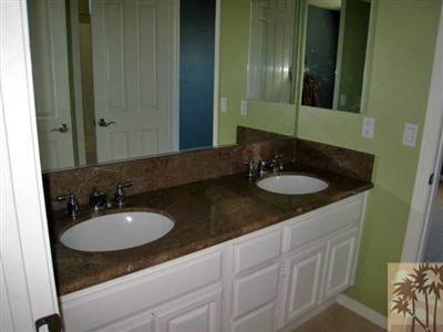 81908 Villa Reale Drive Indio, CA 92203 - Photo 20 of 25 a bathroom with a sink and a mirror