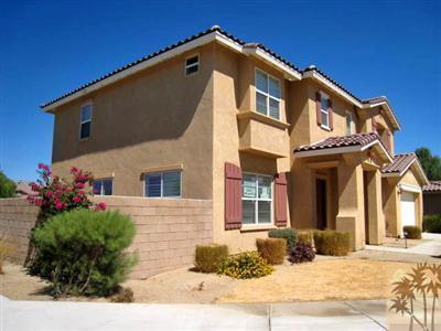81908 Villa Reale Drive Indio, CA 92203 - Photo 2 of 25 a front view of a house