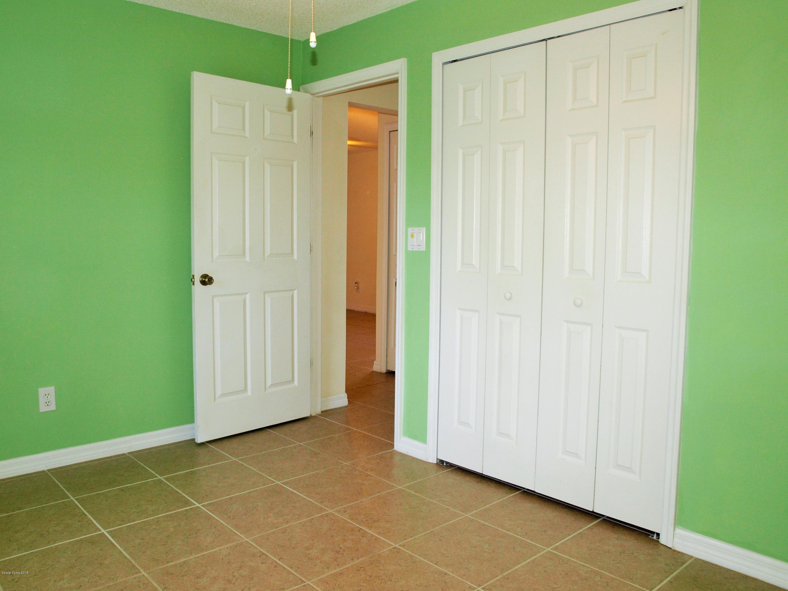 247 Crystal Lake Road Melbourne, FL 32901 - Photo 14 of 22 a view of an empty room