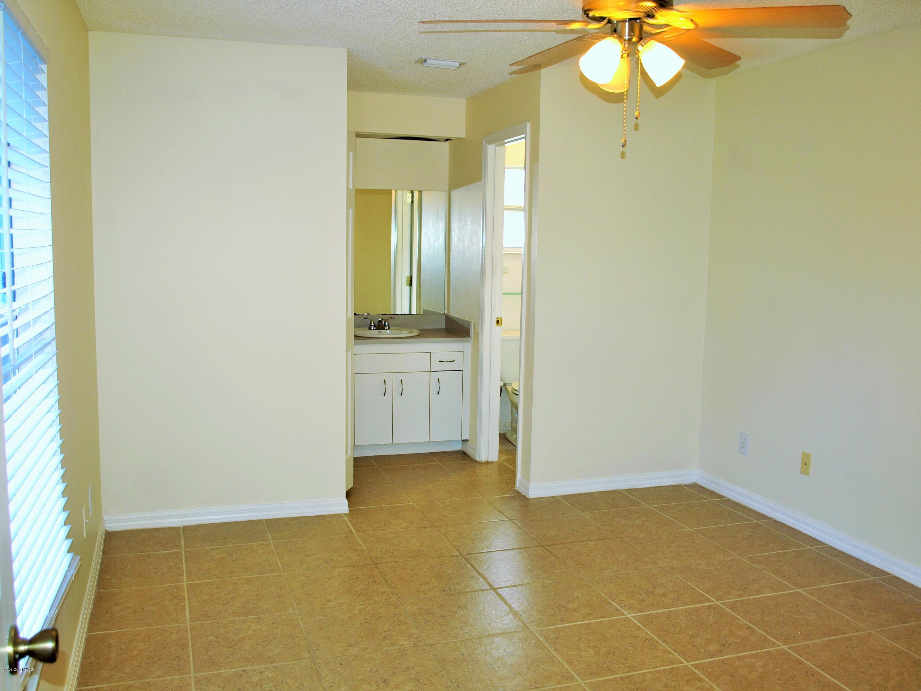247 Crystal Lake Road Melbourne, FL 32901 - Photo 8 of 22 a view of empty room