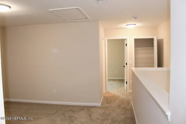 a bathroom with a tub and shower