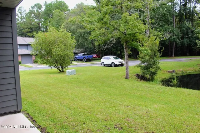 a view of a garden with a bench